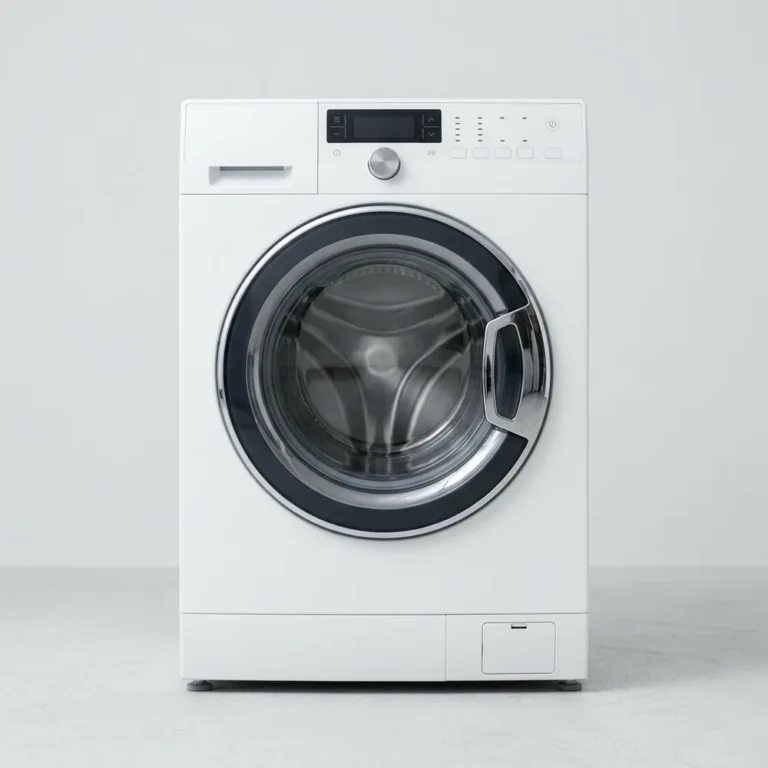 White front-load washer dryer combination machine built into a laundry nook.